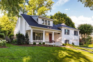 Large traditional white split-level mixed siding exterior home idea in DC Metro with a shingle roof