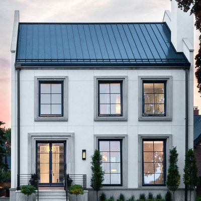 Transitional white two-story exterior home photo in Chicago with a metal roof
