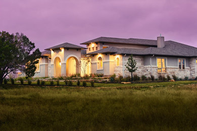 Example of a transitional exterior home design in Austin
