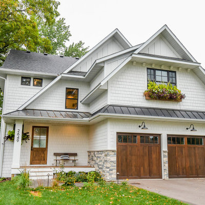 Example of a transitional white two-story exterior home design in Minneapolis