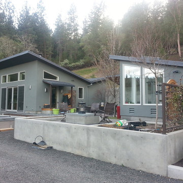 Modern, Energy Efficient Home with outdoor living space, raised bed gard