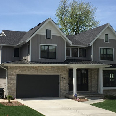 Mid-sized transitional gray two-story mixed siding exterior home photo in Chicago with a shingle roof