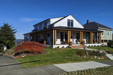 Example of a cottage exterior home design in Seattle