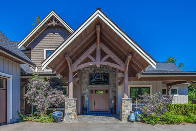 Large arts and crafts exterior home photo in Vancouver