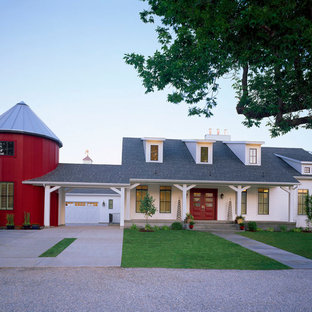 Mid-sized cottage white two-story wood exterior home idea in Salt Lake City with a hip roof