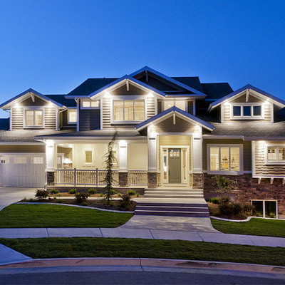 Inspiration for a large craftsman beige two-story concrete fiberboard exterior home remodel in Salt Lake City