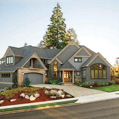 Elegant wood exterior home photo in Cleveland