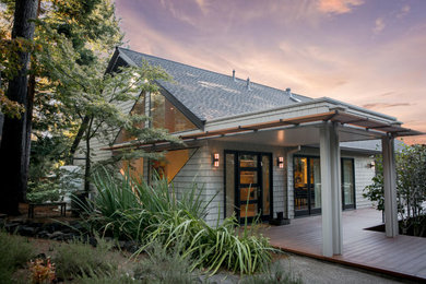 Mid-sized trendy gray two-story wood exterior home photo in San Francisco with a shingle roof