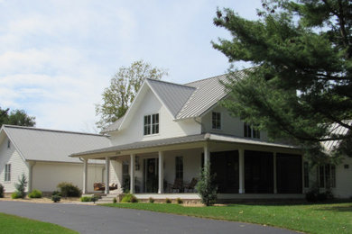 Example of a cottage exterior home design in Other