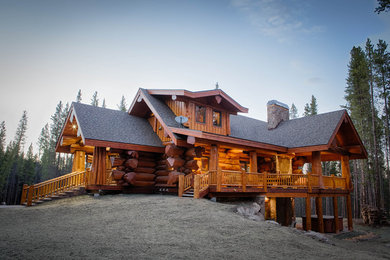 Inspiration for a mid-sized rustic brown three-story mixed siding exterior home remodel in Denver with a shingle roof