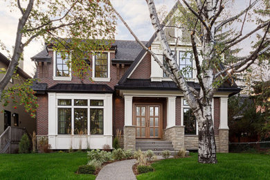 Large traditional two-story exterior home idea in Calgary