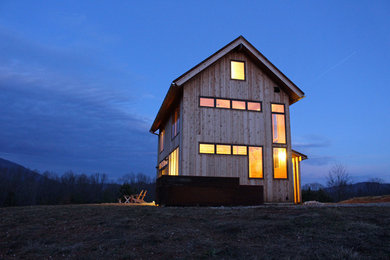 Small minimalist brown two-story wood gable roof photo in Richmond