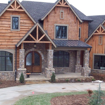 Mountain home with rustic wood siding