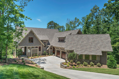 Large rustic gray two-story wood exterior home idea in Charlotte with a shingle roof