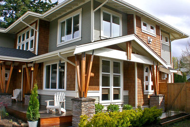Example of an arts and crafts two-story exterior home design in Seattle