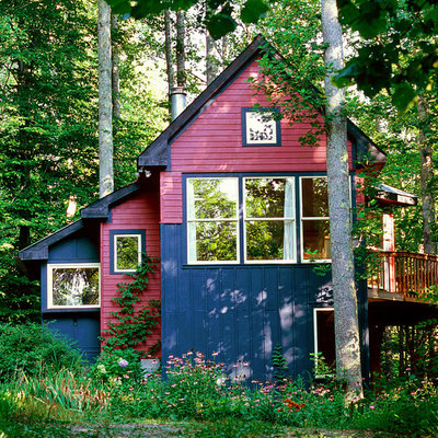 Inspiration for a rustic red exterior home remodel in Nashville