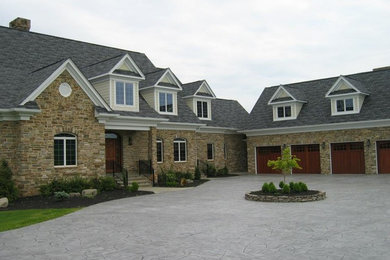 Inspiration for a large two-story brick gable roof remodel in Baltimore