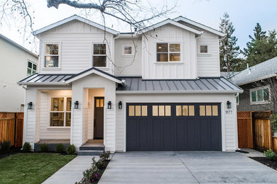 Large cottage white two-story mixed siding house exterior idea in San Francisco with a hip roof and a shingle roof