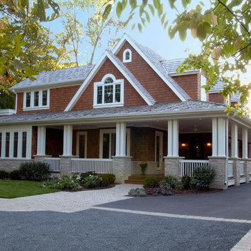 Nantucket Stone and Natural Stain Shingle Style House with Covered Front Porch