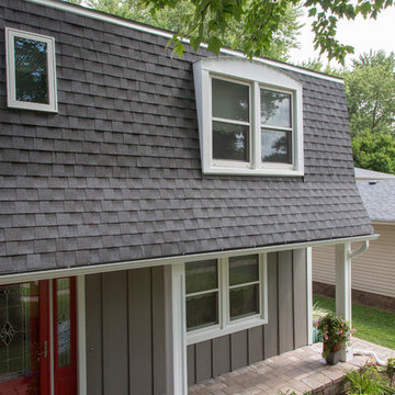 Naperville home with renovated exterior and gambrel roof.