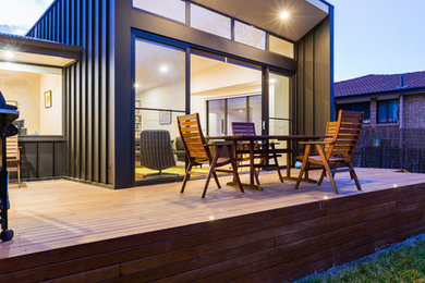 This is an example of a contemporary house exterior in Canberra - Queanbeyan.