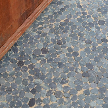 Natural stone sliced pebble tile path