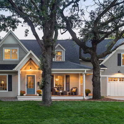 Inspiration for a mid-sized transitional gray two-story concrete fiberboard gable roof remodel in Minneapolis