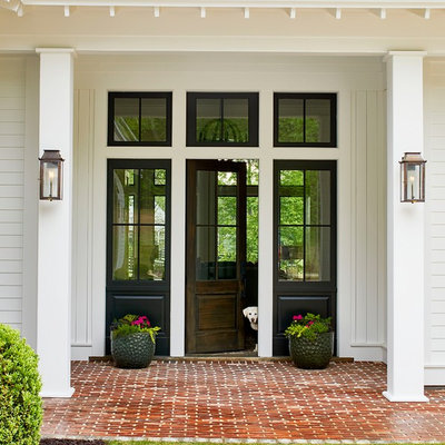 Example of a large classic white one-story wood exterior home design in Atlanta with a metal roof