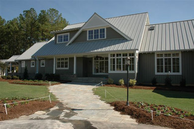 Farmhouse exterior home idea in Raleigh