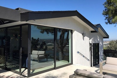 Example of a transitional exterior home design in San Diego