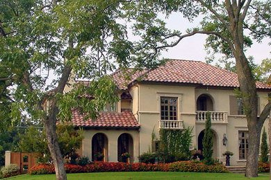 Example of a tuscan exterior home design in Dallas