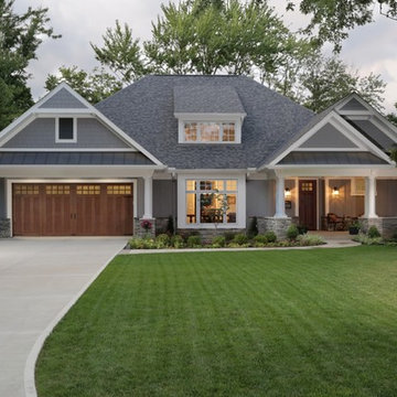 New Craftsman Exterior with Faux Wood Garage Door