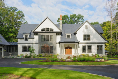 Example of a large transitional white three-story mixed siding gable roof design in DC Metro