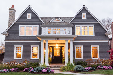 Mid-sized elegant gray two-story wood gable roof photo in Chicago