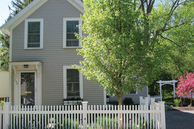 Example of a transitional exterior home design in Boston