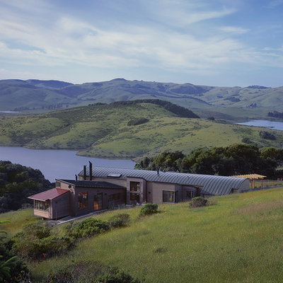 Example of a trendy wood exterior home design in San Francisco