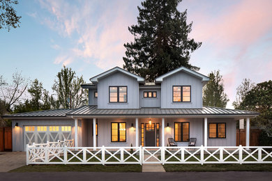 Large country white three-story wood house exterior idea in San Francisco with a metal roof and a hip roof