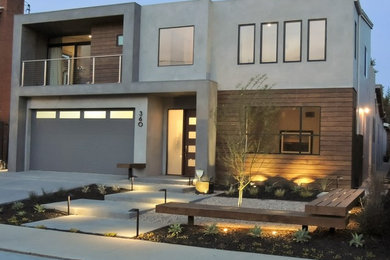 Inspiration for a modern gray two-story wood exterior home remodel in Los Angeles