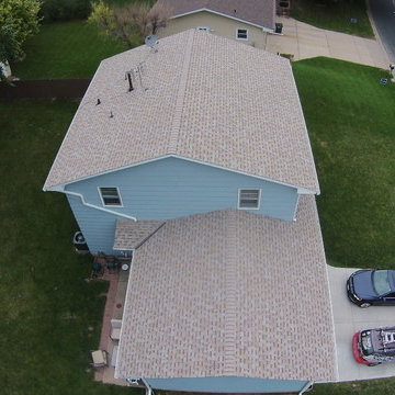 New Owens Corning "Amber" color asphalt shingle roof.