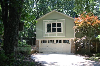 Example of a mid-sized classic two-story concrete exterior home design in Atlanta