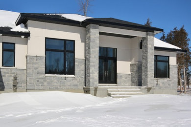 Example of a trendy exterior home design in Toronto