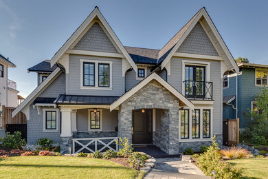 Mid-sized elegant gray two-story concrete fiberboard gable roof photo in Vancouver