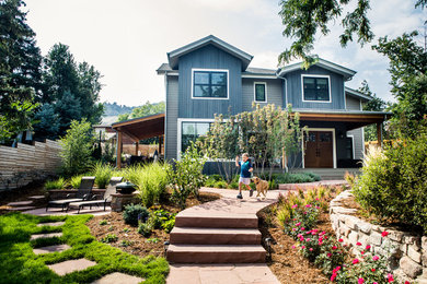 Mid-sized trendy blue two-story wood exterior home photo in Denver