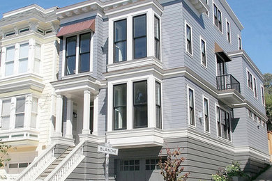 Large elegant gray three-story wood house exterior photo in San Francisco