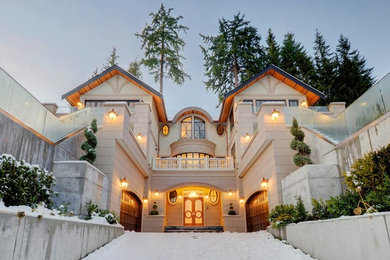 Huge mediterranean beige exterior home idea in Vancouver