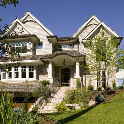 Elegant stone exterior home photo in Minneapolis