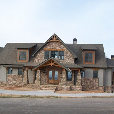 Inspiration for a large craftsman gray two-story mixed siding gable roof remodel in Atlanta