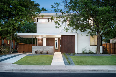 Example of a small transitional multicolored two-story wood house exterior design in Austin