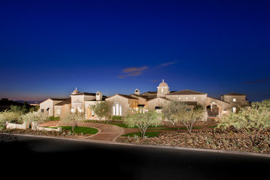 Inspiration for a mediterranean exterior home remodel in Phoenix