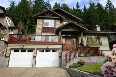 Example of an arts and crafts exterior home design in Vancouver